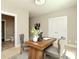 Well-lit office with a desk, two chairs, and access to a bathroom and closet at 926 Steel House Blvd, Charlotte, NC 28205