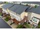 A modern townhouse featuring a private wood deck and a neatly maintained yard, perfect for outdoor relaxation at 926 Steel House Blvd, Charlotte, NC 28205