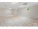 Large basement with tile flooring and windows that provide natural light at 981 Meadowlark Dr, Rock Hill, SC 29732
