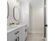 Modern bathroom with double vanity, oval mirrors, and sleek fixtures, offering a stylish space at 981 Meadowlark Dr, Rock Hill, SC 29732