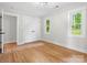 Bedroom featuring hardwood floors, natural light, and closet at 981 Meadowlark Dr, Rock Hill, SC 29732