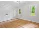 Bright bedroom with hardwood floors, double windows, and closet at 981 Meadowlark Dr, Rock Hill, SC 29732