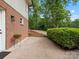 Home exterior with brick and siding, neat landscaping, and a gravel driveway at 981 Meadowlark Dr, Rock Hill, SC 29732