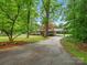 Charming home with a well-maintained front yard and a covered parking area at 981 Meadowlark Dr, Rock Hill, SC 29732