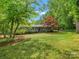 Charming home with a well-maintained front yard and a covered parking area at 981 Meadowlark Dr, Rock Hill, SC 29732