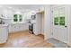 Modern kitchen with stainless steel appliances, white cabinets, and a view to the outdoors from the window at 981 Meadowlark Dr, Rock Hill, SC 29732