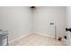 A laundry room with tile flooring, white paneled walls, and utility connections at 981 Meadowlark Dr, Rock Hill, SC 29732