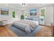 This main bedroom features a picture window, hardwood floors, tasteful decor, and a blue rug at 981 Meadowlark Dr, Rock Hill, SC 29732