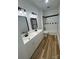 Modern bathroom featuring dual vanities, sleek fixtures, and a combined shower/tub at 1019 Valley St, Kannapolis, NC 28081
