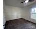 Cozy bedroom with plush carpeting, natural light, and ample space at 1019 Valley St, Kannapolis, NC 28081