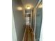 Hallway featuring modern fixtures and built-in shelving leading to the pantry at 1019 Valley St, Kannapolis, NC 28081