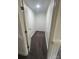 Small, carpeted storage area with finished walls and beadboard trim detail at 1019 Valley St, Kannapolis, NC 28081