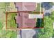 Aerial shot of home and lot with landscaping and concrete driveway in a well-kept neighborhood at 1027 Feather Oak Ln, Matthews, NC 28104