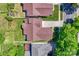 Aerial shot of home and lot with landscaping and concrete driveway in a well-kept neighborhood at 1027 Feather Oak Ln, Matthews, NC 28104