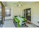 Bright screened-in porch with view of the open backyard, offering outdoor living space at 1027 Feather Oak Ln, Matthews, NC 28104