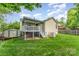This backyard has a deck, stairs, storage, and a large flat lot at 11224 Amber Glen Dr, Charlotte, NC 28269
