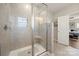 Bathroom featuring a glass shower and ample natural light at 11249 Island View Ln, Lancaster, SC 29720