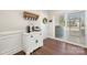 Charming entryway with a coffee bar, decorated door, and access to outdoor patio space at 11249 Island View Ln, Lancaster, SC 29720