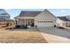 This home offers a convenient attached two-car garage and a cozy screened-in porch for outdoor relaxation at 11249 Island View Ln, Lancaster, SC 29720