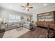 Comfortable living area showcasing stylish decor, natural light, and luxury vinyl flooring throughout at 11249 Island View Ln, Lancaster, SC 29720