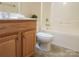 Bathroom with a single sink vanity, tub, and toilet at 121 Marcella Dr, Kings Mountain, NC 28086