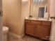 A powder room featuring a wood vanity and a framed mirror at 121 Marcella Dr, Kings Mountain, NC 28086