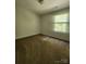 This is a cozy bedroom with one window and carpet flooring at 121 Marcella Dr, Kings Mountain, NC 28086