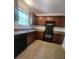 The kitchen has essential appliances, sleek countertops, and ample cabinetry at 121 Marcella Dr, Kings Mountain, NC 28086