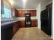 The kitchen has essential appliances, sleek countertops, and ample cabinetry at 121 Marcella Dr, Kings Mountain, NC 28086