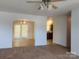 The open-concept living room features an archway and abundant natural light at 121 Marcella Dr, Kings Mountain, NC 28086