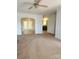 Spacious living room leading to the dining room with carpeted floors at 121 Marcella Dr, Kings Mountain, NC 28086