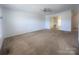 Living area featuring carpet floors and access to other rooms at 121 Marcella Dr, Kings Mountain, NC 28086