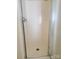 A compact shower featuring a glass door and classic chrome fixtures, providing functionality at 121 Marcella Dr, Kings Mountain, NC 28086