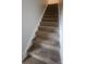 Carpeted stairway leading to the upper level of the home at 121 Marcella Dr, Kings Mountain, NC 28086