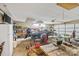 A garage with lawn equipment, boat, work benches, and a refrigerator at 130 Helen Dr, Statesville, NC 28625