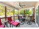 Inviting covered patio with ceiling fan and outdoor furniture for relaxing or entertaining at 13502 Brandon Trail Dr, Charlotte, NC 28213