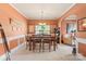 Spacious dining room featuring a wooden table, elegant chandelier, and beautiful wall trim at 13502 Brandon Trail Dr, Charlotte, NC 28213