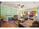 Cozy living room with hardwood floors, comfortable seating, and an open layout at 13502 Brandon Trail Dr, Charlotte, NC 28213