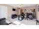 Bright office with neutral walls, with a desk area and a place to relax at 13502 Brandon Trail Dr, Charlotte, NC 28213