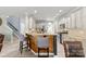 Kitchen featuring granite countertops, stainless steel appliances, and a breakfast bar at 137 Sugar Magnolia Dr, Mooresville, NC 28115