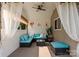 Inviting outdoor living space with comfortable seating, ideal for entertaining or relaxing at 137 Sugar Magnolia Dr, Mooresville, NC 28115