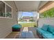 Relaxing porch with a view of the pool and backyard, providing a tranquil retreat at 137 Sugar Magnolia Dr, Mooresville, NC 28115