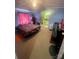 A bedroom with hardwood floors and a bright window at 143 Greenville Blvd, Bessemer City, NC 28016