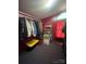 Walk-in closet with multiple hanging clothes and shelves at 143 Greenville Blvd, Bessemer City, NC 28016