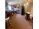 A kitchen with appliances and cherry-colored cabinets at 143 Greenville Blvd, Bessemer City, NC 28016