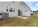 Backyard features include a patio, privacy fence, and green space at 15622 Little Bluestem St, Charlotte, NC 28278