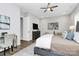 Cozy bedroom with a comfortable bed, desk, and ample natural light at 16012 Tulloch Rd, Charlotte, NC 28278