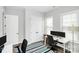 Dedicated home office space featuring two desks and natural light at 16012 Tulloch Rd, Charlotte, NC 28278
