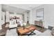 Open-concept living room showcasing modern decor and flow to the kitchen at 16012 Tulloch Rd, Charlotte, NC 28278