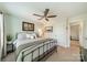 Bedroom with neutral walls, ceiling fan, and doorway to connecting room at 16507 Palisades Commons Dr, Charlotte, NC 28278